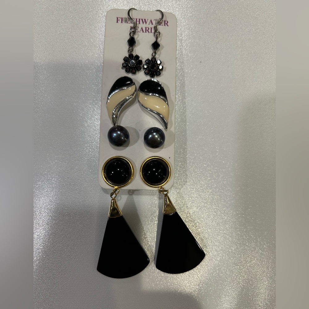 Lot of 4 Pair of pierced earrings.